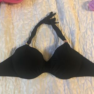 Black Victoria’s Secret swim top.